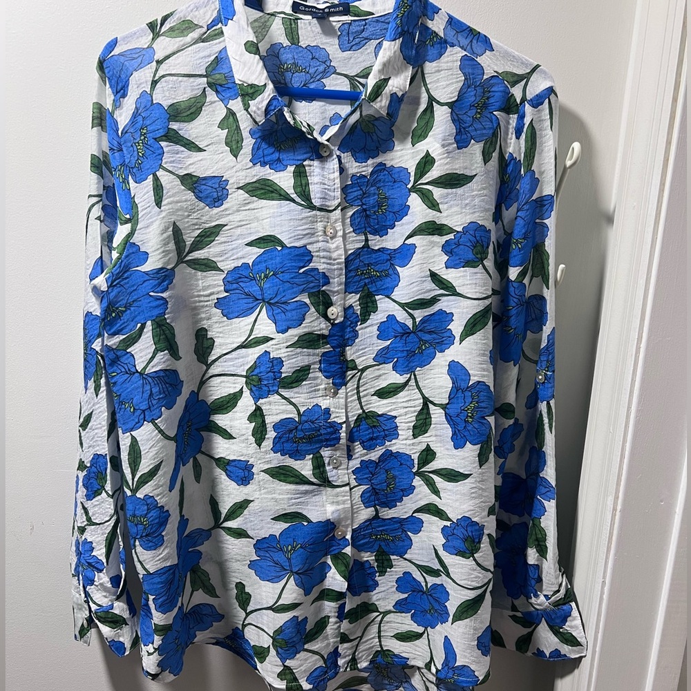 Vibrant white and blue floral blouse.